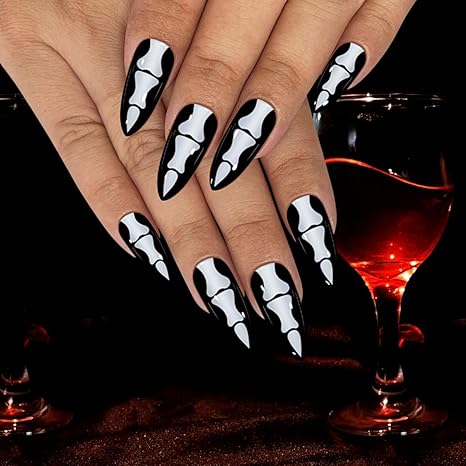 Yivaiks Halloween Press on Nails Medium Stiletto Acrylic Press Ons Skeleton Vampire Nails Artificial Black False Fake Nails With Glue on Halloween Nail Charms Kit 24pcs - sugar skull nail art